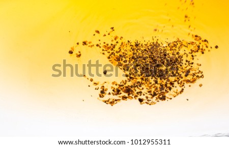 Coffe slowly dissolve in the hot water
