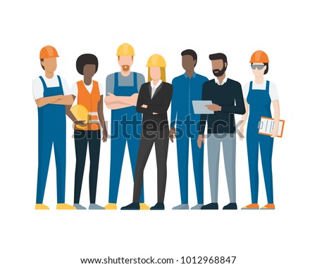 Industrial workers standing together: manual workers, technicians, engineers and manager Royalty-Free Stock Photo #1012968847