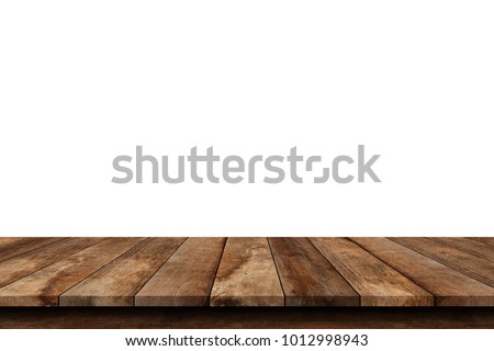 Wooden old table isolated on white background. For your product placement or montage with focus to the table top in the foreground. Empty wooden dark shelf. shelves Royalty-Free Stock Photo #1012998943
