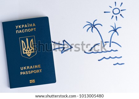 Blue Ukrainian passport and arrow to goal in the picture. Theme - motivation.