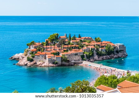 Saint Stephen island near Budva in the sunny day in Montenegro. Beautiful resort place in the Adriatic Sea.  Royalty-Free Stock Photo #1013035357