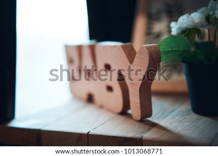 wooden inscription baby
