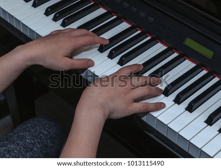 hands of a pianist close-up
