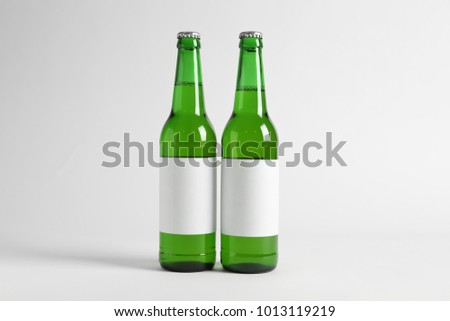 Two bottles of drink on white background. Mockup for design