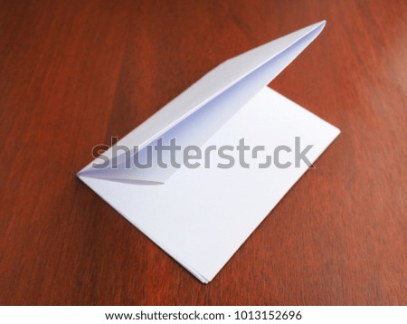paper on a wooden background