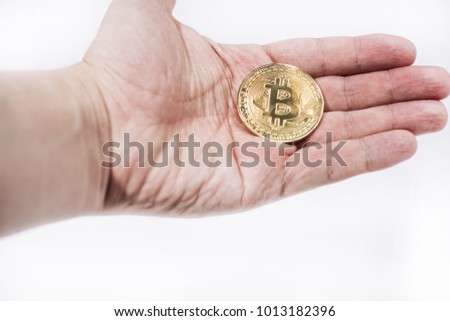 Abstract photo of cryptocyrrency. Some cryptocurrency coins in mans hand. Isolated on white background.
