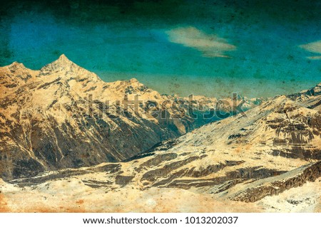 ancient effect picture of High mountains under snow in the winter
