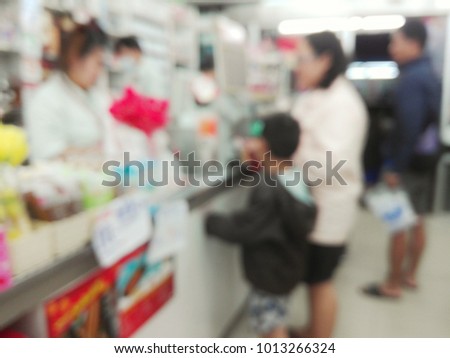 Blurry in convenience store with crowded people,need blur picture