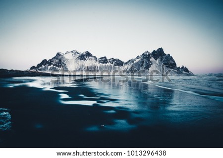 Landscape photo of the Vesturhorn mountains in Southeast Iceland on a cold early morning during the winter of 2017.