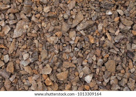 Buff Limestone Class II. Limestone chippings background image. Limestone gravel texture. Excellent base material. Decorative limestone rocks material texture. 