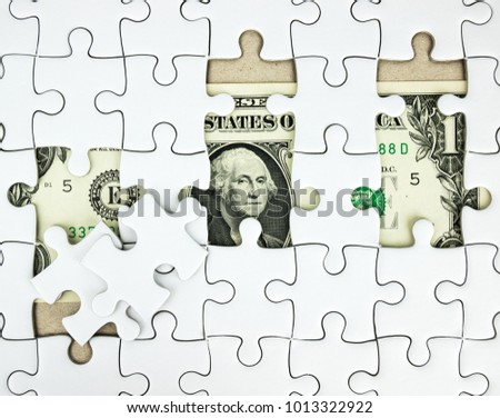 Missing jigsaw puzzle pieces on Dollar money background, Business solution concept, Key for success concept.