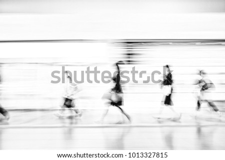The blurred image of asian people in the station  rush time for train subway station