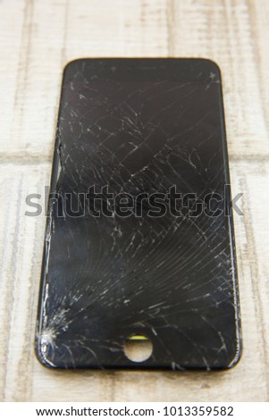 Broken phone screen. Glass cracked