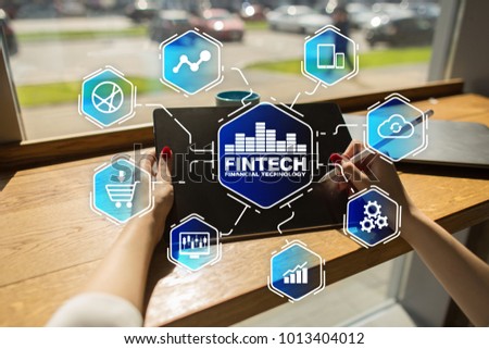Fintech. Financial technology text on virtual screen. Business, internet and technology concept. 