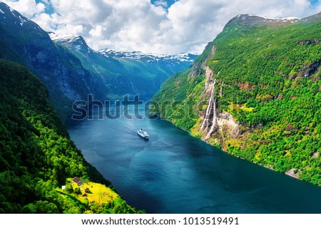 Breathtaking view of Sunnylvsfjorden fjord and famous Seven Sisters waterfalls, near Geiranger village in western Norway. Royalty-Free Stock Photo #1013519491