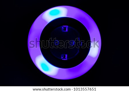 Lamp night light in a dark background. Vintage effect style picture. colorful night light. ring lamp. Neon light circle. the light takes the shape of a circle