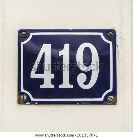 house number four hundred nineteen on an enameled plate
