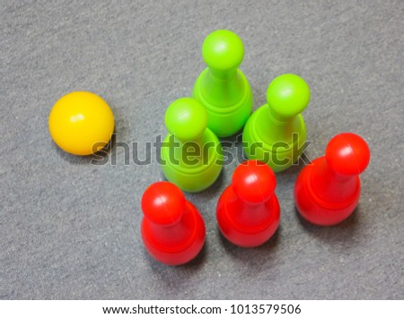 A game of bowling. Multicolored bowling pins for children's games.