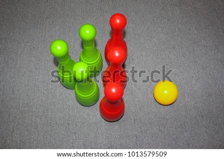 A game of bowling. Multicolored bowling pins for children's games.