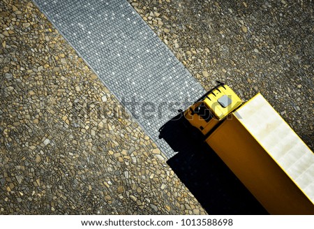 background abstract yellow car on the stone pavement