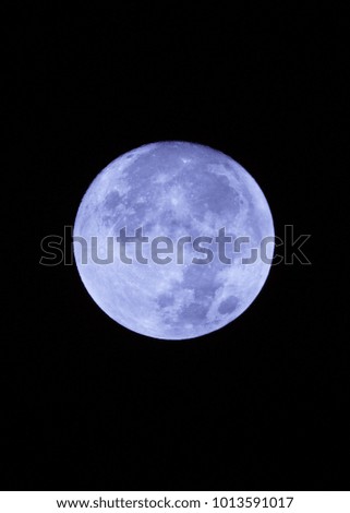 Blue moon in the dark night