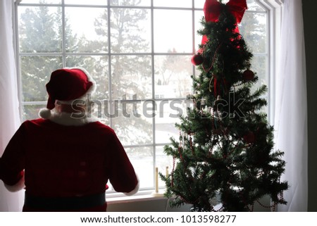 Santa Claus with Christmas Tree