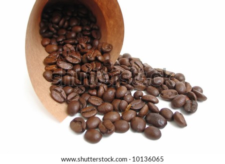 Coffee beans spilling from a paper bag