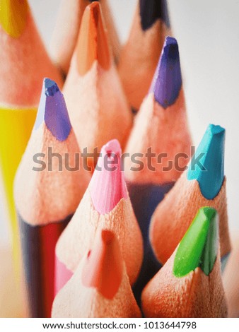 Close up macro shot of color pencil pile pencil nibs.
