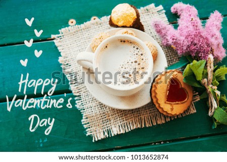 Happy Valentine's Day card. cookies with heart shape on wooden background
