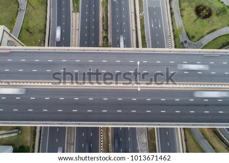 Aerial bird eye view intersection traffic road with car rush movement, Transport concept