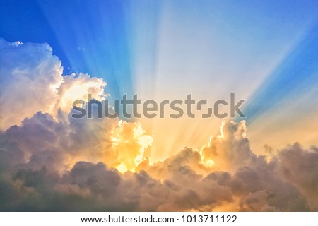 abstract sun beam line light shining through the clouds, Sunbeam through the clouds haze on Beautiful sky Royalty-Free Stock Photo #1013711122