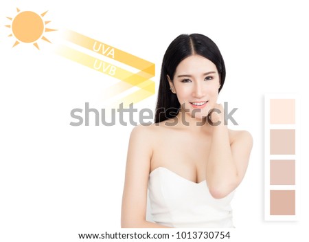 Beautiful woman with clean skin - concept of Asian beauty and Sun block skin