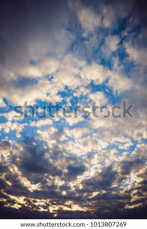 vintage tone image of blue sky and white cloud on day time for background usage.(vertical)