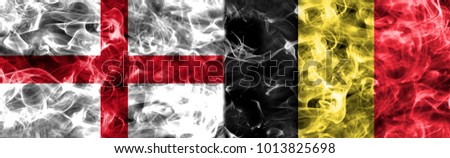 England vs Belgium smoke flag Royalty-Free Stock Photo #1013825698