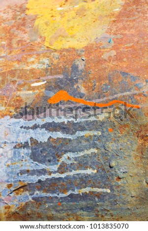 Crannied old paint on the yacht. It looks like abstract painting. Crete, Greece