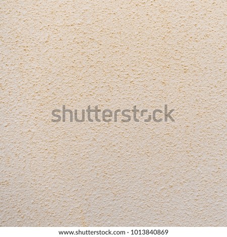 beige coarse paint on the wall