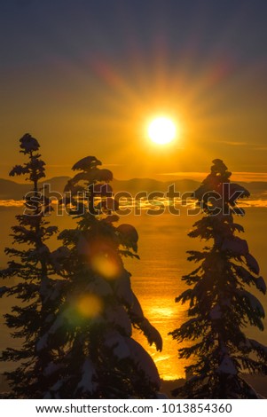 beautiful winter sunset with snow landscape on Grouse mountain Vancouver Canada