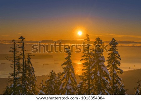 beautiful winter sunset with snow landscape on Grouse mountain Vancouver Canada