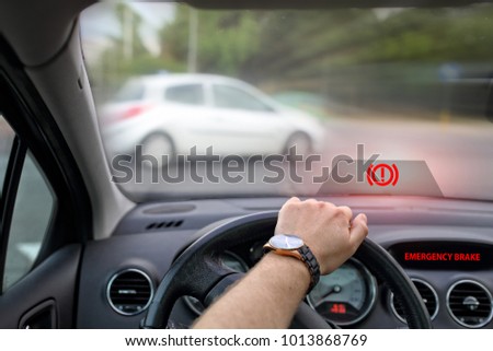 emergency braking to avoid collision in the car Royalty-Free Stock Photo #1013868769