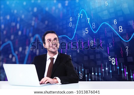 Businessman using laptop at white desk with forex chart in the background. Stock and investment concept