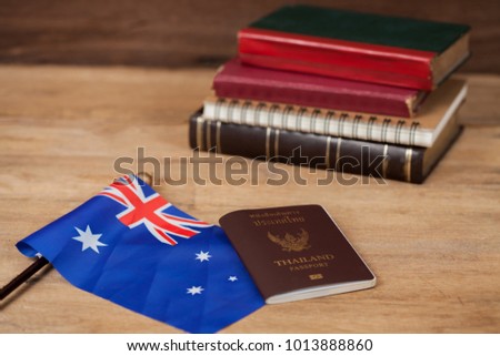 Education in Australia concept,passport and white note on Australia flag .