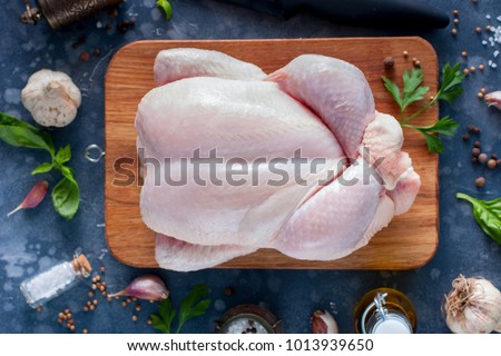 Raw chicken for a recipe, top view, horizontal Royalty-Free Stock Photo #1013939650