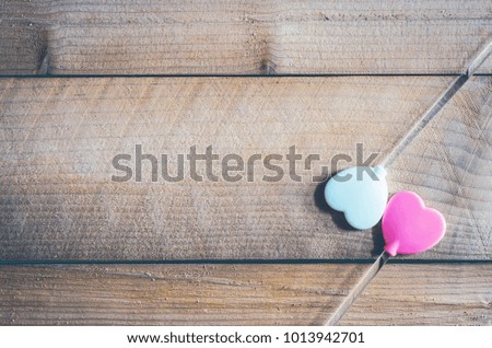 two heart love white and pink color on wood table. love concept. valentine day concept. valentines background.