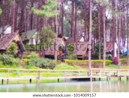 blur picture of the cottage on the lake at pang ung in mae hong son thailand.