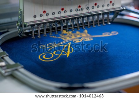 seamstress clothing industry embroidery
industrial embroidery
sewing machine Royalty-Free Stock Photo #1014012463