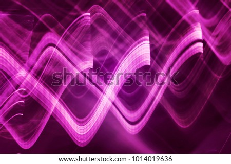 Abstract background of blue and violet neon glowing light shapes. Bright stripes  Can use for poster, website, brochure, print.