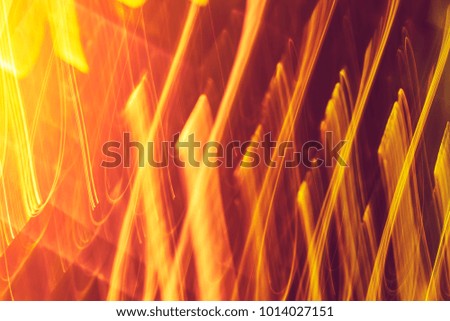 Abstract background of red neon glowing light shapes. Bright gold  stripes  Can use for poster, website, brochure, print.
