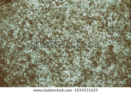 Granite rock closeup background, stone texture, cracked surface
