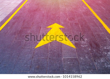 yellow arrow pointer on the road shows the path and direction