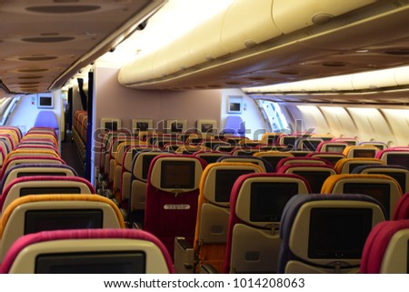 Picture of passenger seat in aircraft.